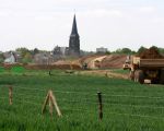 Gronddepot ten noorden van Borgharen. Op de achtergrond de kerk van Borgharen.  (19-5-2010 - Jan Dolmans)